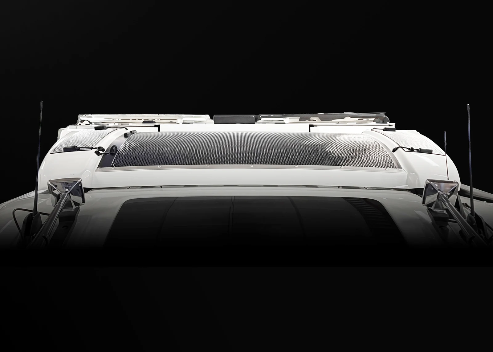 Solar panels mounted on the wind deflector of a Volvo high cab